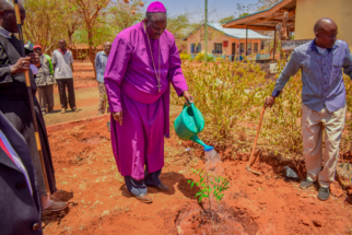 His Grace Planting a tree at the Kisesini health dispensary